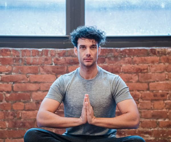 Detail of a calm yoga pose for mental focus